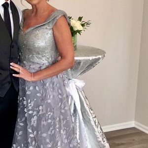 Beautiful gown worn once to daughters wedding.  Lebanese designer Gemy Malouf